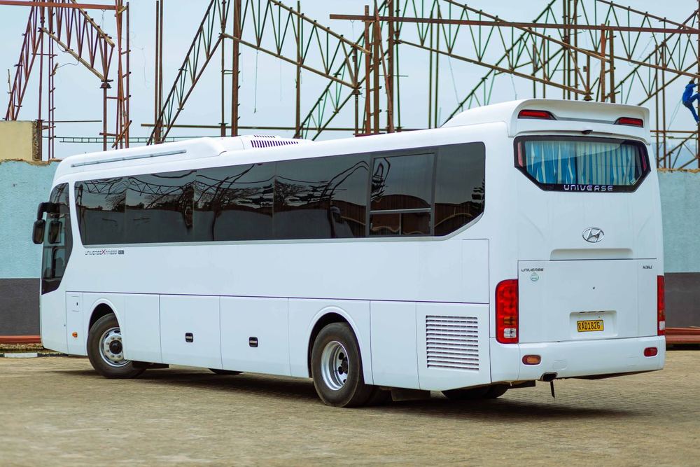 A modern white coach bus for large groups
